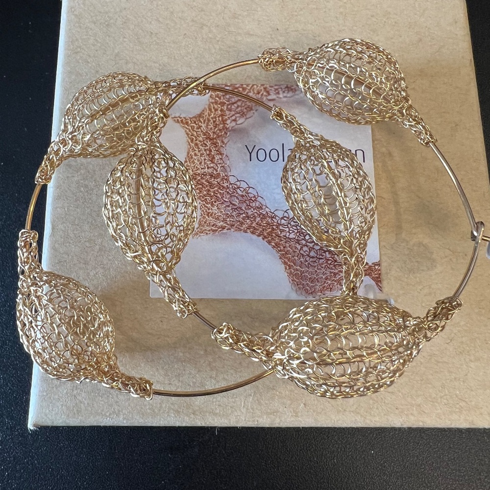 Gold hand crochet hook earrings, $100 each